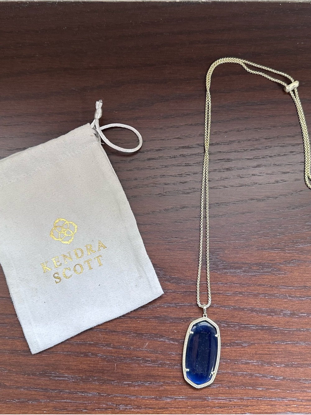 Kendra Scott Gold Necklace with Deep Blue Pendant